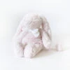 Dimpel Flore Le Lapin Boite à Musique Rose Pâle Noeud Blanc -Jouets En Peluche Boutique flore20lapin20boite20a20musique20rose20pale20noeud20blanc